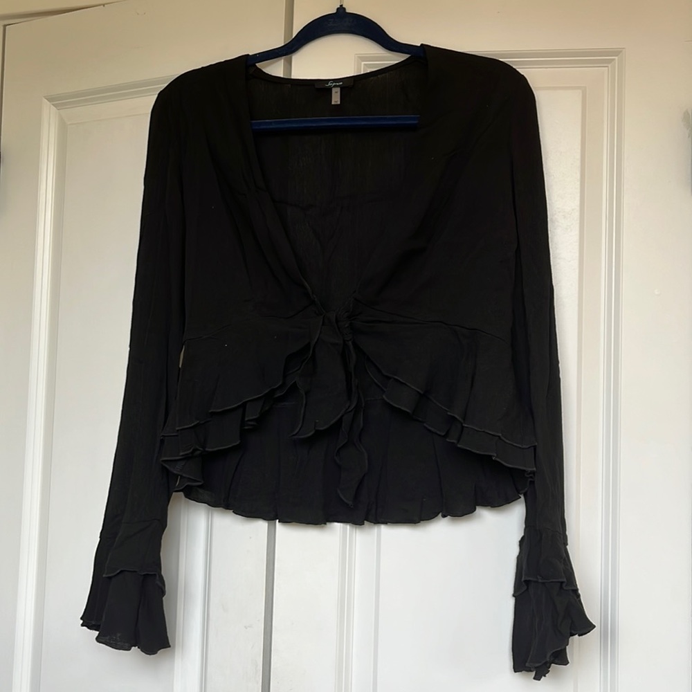 Black ruffle front tie blouse
